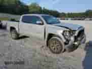 2019 Toyota Tacoma SR5 z VIN 3TMCZ5AN7KM211948, wystawiony jako Copart lot #81644285 z przebiegiem 152 496 mil mil oraz Szkoda całkowita • Salvage title. Historia ofert i sprzedaży dostępna na DreamBid. Obrazek 4.