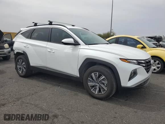 2024 Hyundai Tucson Blue with VIN KM8JBCD1XRU210836, listed as a Copart auction lot 70576955 with 13,043 mi miles and Salvage title. Bid and sale history available at DreamBid. Image 4.