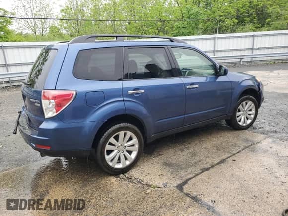 2011 Subaru Forester X Premium with VIN JF2SHADC9BG708285, listed as a Copart auction lot 56581055 with 160,424 mi miles and Clean title. Bid and sale history available at DreamBid. Image 3.