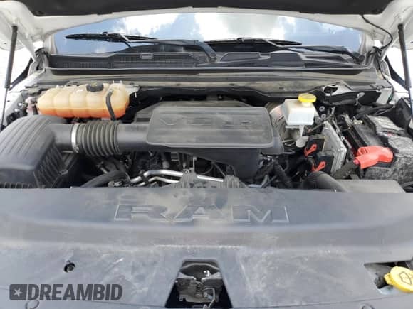 2020 Ram 1500 Big Horn z VIN 1C6RREFG6LN289012, wystawiony jako Copart lot #61009815 z przebiegiem 129 977 mil mil oraz Szkoda całkowita • Salvage title. Historia ofert i sprzedaży dostępna na DreamBid. Obrazek 11.