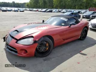 2005 Dodge Viper SRT-10 with VIN 1B3JZ65Z75V500947, listed as a Copart auction lot 80869505 with 39,336 mi miles and Salvage title. Bid and sale history available at DreamBid. Image 1.
