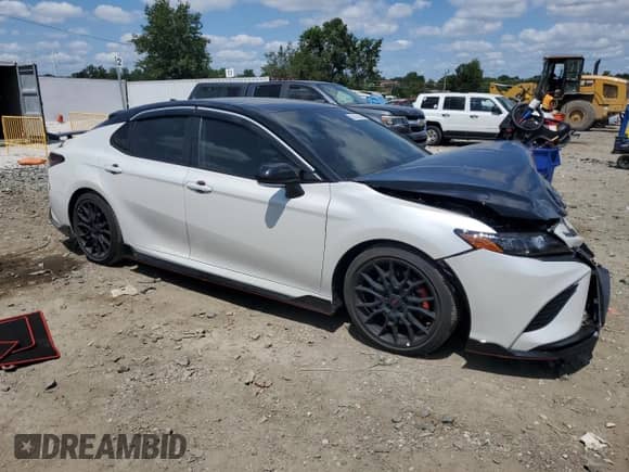 2022 Toyota Camry TRD with VIN 4T1KZ1AK6NU067766, listed as a Copart auction lot 68042055 with 22,775 mi miles and Salvage title. Bid and sale history available at DreamBid. Image 4.