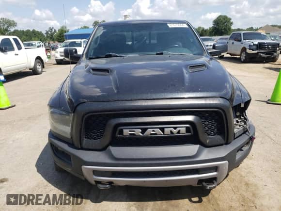 2015 Ram 1500 Rebel with VIN 1C6RR7YT4FS751370, listed as a Copart auction lot 61675064 with 90,245 mi miles and Salvage title. Bid and sale history available at DreamBid. Image 5.