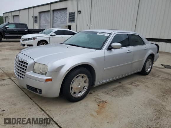 2005 Chrysler 300 Touring с VIN 2C3AA53GX5H613239, выставлен на аукционе Copart как лот 66903215 с пробегом 263 686 миль миль и Списание • Salvage title. История ставок и продаж доступна на DreamBid. Изображение 1.