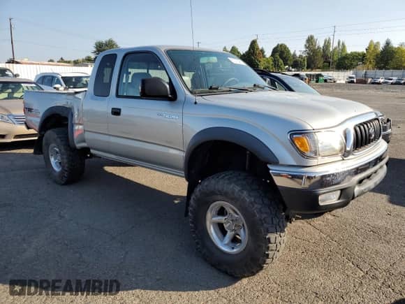 2002 Toyota Tacoma z VIN 5TEWN72NX2Z070220, wystawiony jako Copart lot #81276465 z przebiegiem 143 793 mil mil oraz Szkoda całkowita • Salvage title. Historia ofert i sprzedaży dostępna na DreamBid. Obrazek 4.