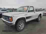 1988 Dodge Dakota с VIN 1B7GR14X7JS669387, выставлен на аукционе Copart как лот 86555654 с пробегом 170 933 миль миль и Чистый • Clean title. История ставок и продаж доступна на DreamBid. Изображение 1.