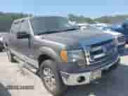 2013 Ford F-150 Lariat with VIN 1FTFW1ET5DFC93463, listed as a IAAI auction lot 43182949 with 133,397 mi miles and . Bid and sale history available at DreamBid. Image 1.