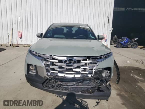 2022 Hyundai Santa Cruz SEL с VIN 5NTJBDAE6NH020359, выставлен на аукционе Copart как лот 75840064 с пробегом 14 544 миль миль и Списание • Salvage title. История ставок и продаж доступна на DreamBid. Изображение 5.