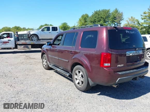 2009 Honda Pilot Touring with VIN 5FNYF48939B005946, listed as a IAAI auction lot 43178572 with 158,130 mi miles and . Bid and sale history available at DreamBid. Image 3.