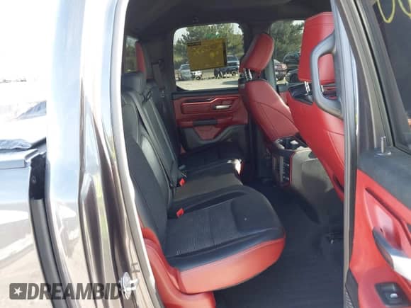 2019 Ram 1500 Rebel with VIN 1C6RRFEG1KN831963, listed as a IAAI auction lot 43116060 with 120,825 mi miles and . Bid and sale history available at DreamBid. Image 8.