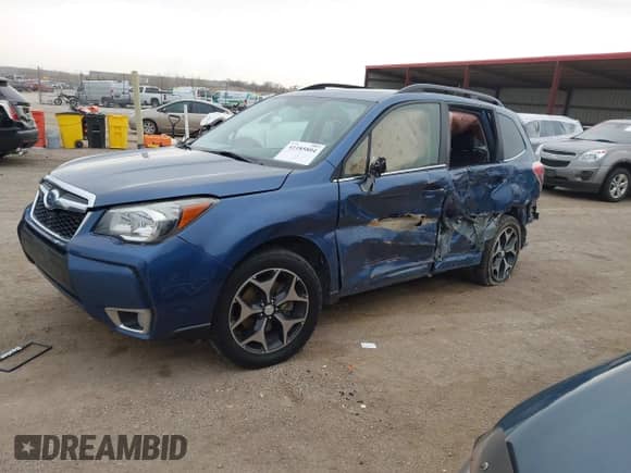 2014 Subaru Forester XT Touring z VIN JF2SJGMC9EH428341, wystawiony jako IAAI lot #41185804 z przebiegiem 111 000 mil mil oraz . Historia ofert i sprzedaży dostępna na DreamBid. Obrazek 2.