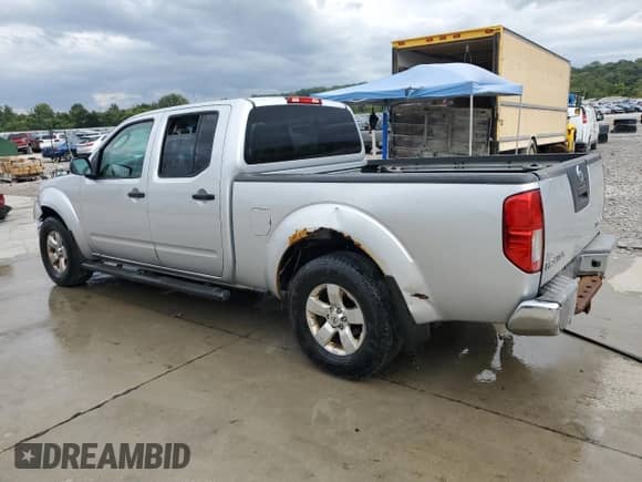 2010 Nissan Frontier SE with VIN 1N6AD0FV6AC441284, listed as a Copart auction lot 83844865 with 282,726 mi miles and Salvage title. Bid and sale history available at DreamBid. Image 2.