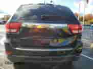 2013 Jeep Grand Cherokee Limited z VIN 1C4RJFBG2DC640359, wystawiony jako Copart lot #86685655 z przebiegiem 150 067 mil mil oraz Szkoda całkowita • Salvage title. Historia ofert i sprzedaży dostępna na DreamBid. Obrazek 6.