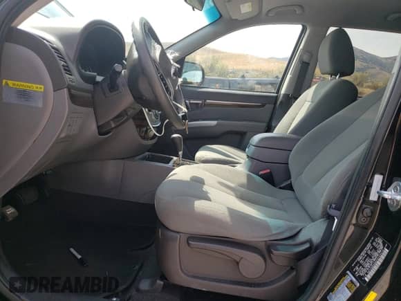 2012 Hyundai Santa Fe GLS с VIN 5XYZGDAG6CG105016, выставлен на аукционе Copart как лот 70603325 с пробегом 132 515 миль миль и Списание • Salvage title. История ставок и продаж доступна на DreamBid. Изображение 7.