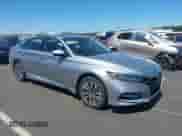 2018 Honda Accord EX-L with VIN 1HGCV3F50JA015873, listed as a IAAI auction lot 43141766 with 152,543 mi miles and . Bid and sale history available at DreamBid. Image 1.