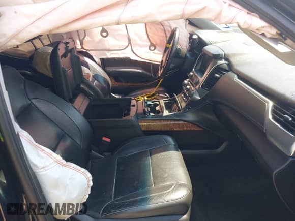 2017 Chevrolet Suburban Premier z VIN 1GNSCJKC1HR148945, wystawiony jako IAAI lot #42950077 z przebiegiem 160 090 mil mil oraz . Historia ofert i sprzedaży dostępna na DreamBid. Obrazek 5.