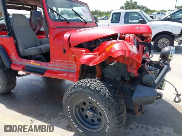 1989 Jeep Wrangler with VIN 2J4FY39T9KJ141247, listed as a IAAI auction lot 42783916 with 165,419 mi miles and . Bid and sale history available at DreamBid. Image 14.