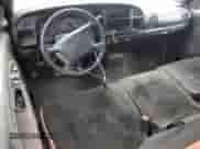 2000 Dodge 1500 z VIN 1B7HC13YXYJ173323, wystawiony jako Copart lot #69969774 z przebiegiem 425 918 mil mil oraz Szkoda całkowita • Salvage title. Historia ofert i sprzedaży dostępna na DreamBid. Obrazek 8.