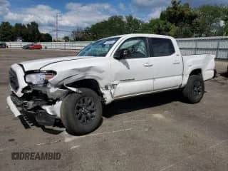 2022 Toyota Tacoma SR5 with VIN 3TMAZ5CN3NM190699, listed as a Copart auction lot 70325045 with 22,489 mi miles and Salvage title. Bid and sale history available at DreamBid. Image 1.