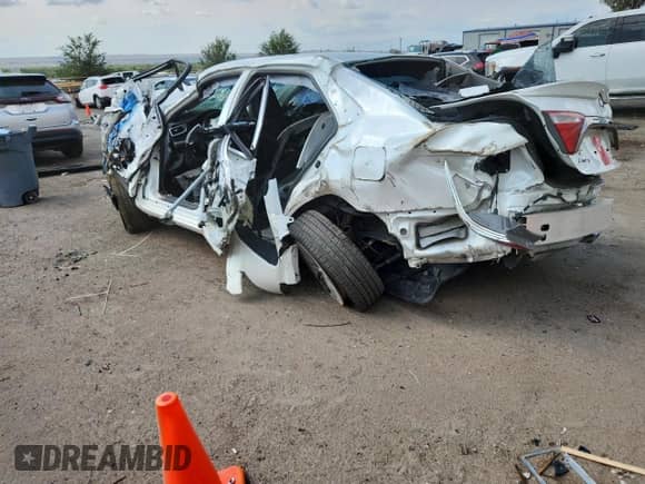 2015 Toyota Camry LE с VIN 4T1BD1FK1FU175186, выставлен на аукционе Copart как лот 69825435 с пробегом Не указан миль и Списание • Salvage title. История ставок и продаж доступна на DreamBid. Изображение 2.