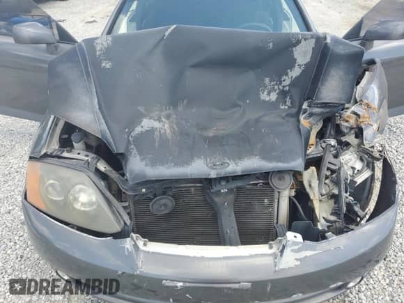 2004 Hyundai Tiburon GT с VIN KMHHN65F64U134817, выставлен на аукционе Copart как лот 66358955 с пробегом Не указан миль и Списание • Salvage title. История ставок и продаж доступна на DreamBid. Изображение 11.