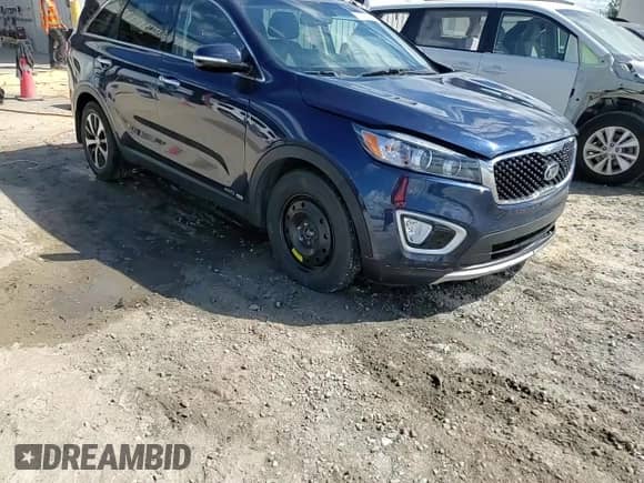 2016 Kia Sorento EX z VIN 5XYPHDA57GG179263, wystawiony jako Copart lot #86156115 z przebiegiem 142 646 mil mil oraz Szkoda całkowita • Salvage title. Historia ofert i sprzedaży dostępna na DreamBid. Obrazek 14.