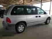 2000 Dodge Caravan with VIN 2B4GP25GXYR896821, listed as a Copart auction lot 58079985 with 217,327 mi miles and Salvage title. Bid and sale history available at DreamBid. Image 3.