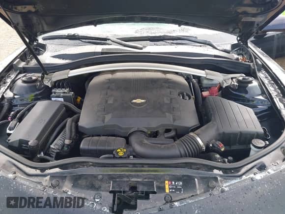 2015 Chevrolet Camaro LT z VIN 2G1FD3D34F9298127, wystawiony jako IAAI lot #42837699 z przebiegiem 77 605 mil mil oraz . Historia ofert i sprzedaży dostępna na DreamBid. Obrazek 10.