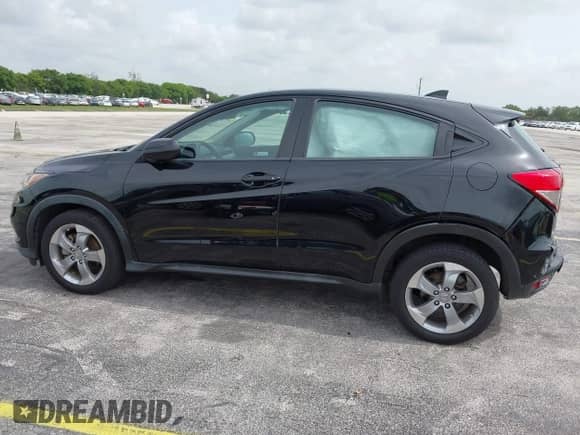2019 Honda HR-V LX with VIN 3CZRU6H36KG704306, listed as a IAAI auction lot 42615826 with 54,723 mi miles and . Bid and sale history available at DreamBid. Image 14.