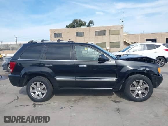 2009 Jeep Grand Cherokee with VIN 1J8HS68T49C524111, listed as a IAAI auction lot 41605917 with 133,441 mi miles and . Bid and sale history available at DreamBid. Image 14.