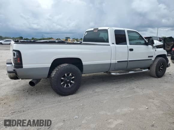2002 Dodge 2500 with VIN 3B7KC23642M206966, listed as a Copart auction lot 67636145 with 245,004 mi miles and Salvage title. Bid and sale history available at DreamBid. Image 3.