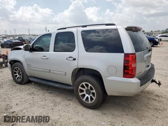 2010 Chevrolet Tahoe LS with VIN 1GNUCAE09AR285308, listed as a Copart auction lot 61646445 with 196,980 mi miles and Salvage title. Bid and sale history available at DreamBid. Image 2.