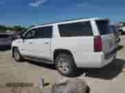 2019 Chevrolet Suburban LT with VIN 1GNSKHKCXKR405488, listed as a Copart auction lot 57905295 with 147,618 mi miles and Salvage title. Bid and sale history available at DreamBid. Image 2.