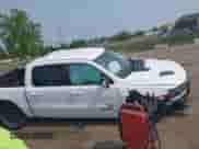 2022 Ram 1500 Rebel z VIN 1C6SRFLT5NN318494, wystawiony jako IAAI lot #42413194 z przebiegiem 59 458 mil mil oraz . Historia ofert i sprzedaży dostępna na DreamBid. Obrazek 13.