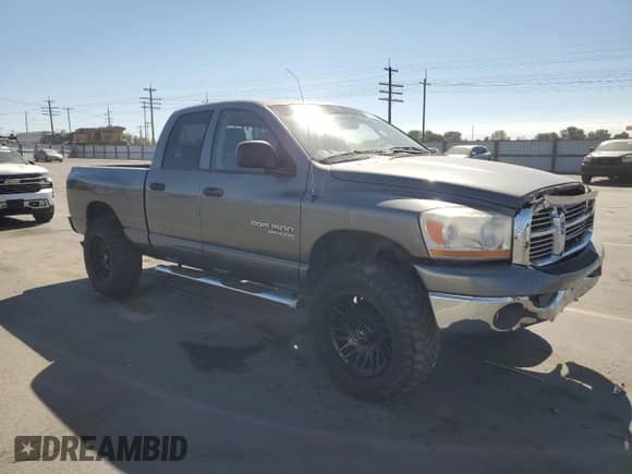2006 Dodge 1500 SLT with VIN 1D7HU18N66S697514, listed as a Copart auction lot 82067275 with 193,347 mi miles and Salvage title. Bid and sale history available at DreamBid. Image 4.