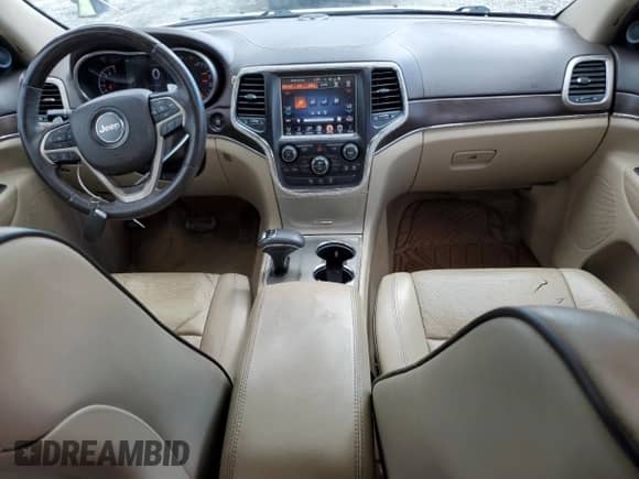 2015 Jeep Grand Cherokee Overland z VIN 1C4RJECG6FC734840, wystawiony jako Copart lot #69043835 z przebiegiem 193 893 mil mil oraz Szkoda całkowita • Salvage title. Historia ofert i sprzedaży dostępna na DreamBid. Obrazek 8.