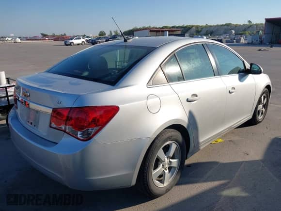 2014 Chevrolet Cruze 1LT with VIN 1G1PC5SB1E7161501, listed as a IAAI auction lot 43359215 with 73,949 mi miles and . Bid and sale history available at DreamBid. Image 4.