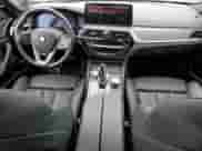 2023 BMW 5 Series 540i xDrive with VIN WBA73BJ05PWY12074, listed as a Copart auction lot 57856525 with 33,616 mi miles and Salvage title. Bid and sale history available at DreamBid. Image 8.