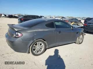 2007 Hyundai Tiburon GS с VIN KMHHM66D07U255007, выставлен на аукционе Copart как лот 87048324 с пробегом 194 935 миль миль и Списание • Salvage title. История ставок и продаж доступна на DreamBid. Изображение 3.