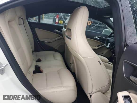 2014 Mercedes-Benz CLA 250 with VIN WDDSJ4GB1EN114111, listed as a Copart auction lot 82165945 with 63,740 mi miles and Salvage title. Bid and sale history available at DreamBid. Image 10.