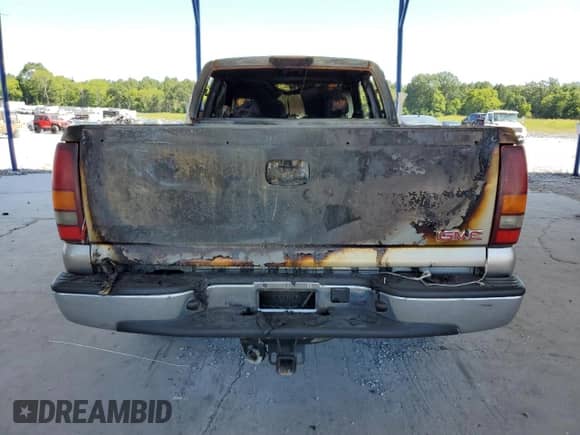 2003 GMC Sierra 1500 SLE with VIN 2GTEC19T431363023, listed as a Copart auction lot 64850105 with Not provided miles and Salvage title. Bid and sale history available at DreamBid. Image 6.