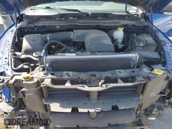 2018 Ram 1500 Big Horn z VIN 1C6RR7LG3JS130012, wystawiony jako Copart lot #70974575 z przebiegiem 119 211 mil mil oraz Szkoda całkowita • Salvage title. Historia ofert i sprzedaży dostępna na DreamBid. Obrazek 11.