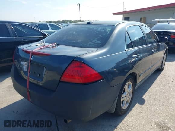 2007 Honda Accord EX-L with VIN 1HGCM56857A183204, listed as a IAAI auction lot 43544482 with 214,802 mi miles and . Bid and sale history available at DreamBid. Image 4.