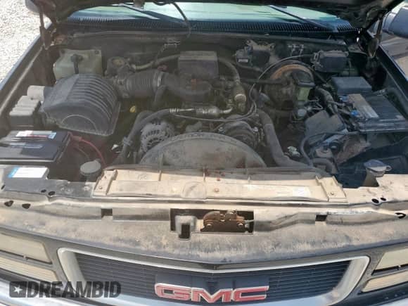 1998 GMC Sierra 1500 z VIN 1GTEC14M8WZ543813, wystawiony jako Copart lot #59757915 z przebiegiem 157 167 mil mil oraz Czysty tytuł • Clean title. Historia ofert i sprzedaży dostępna na DreamBid. Obrazek 11.