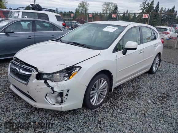 2012 Subaru Impreza Limited с VIN JF1GPAG66CH233385, выставлен на аукционе IAAI как лот 41999104 с пробегом 61 077 миль миль и . История ставок и продаж доступна на DreamBid. Изображение 17.