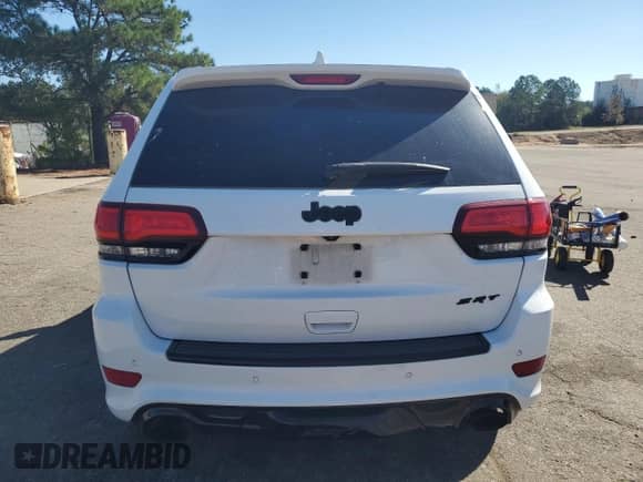 2014 Jeep Grand Cherokee SRT-8 с VIN 1C4RJFDJ2EC542278, выставлен на аукционе Copart как лот 87069095 с пробегом 145 108 миль миль и Чистый • Clean title. История ставок и продаж доступна на DreamBid. Изображение 6.