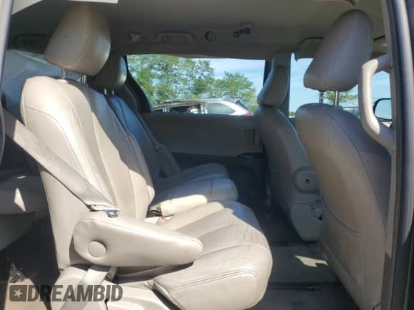 2012 Toyota Sienna with VIN 5TDZK3DC4CS184450, listed as a Copart auction lot 71284385 with 207,878 mi miles and Salvage title. Bid and sale history available at DreamBid. Image 11.