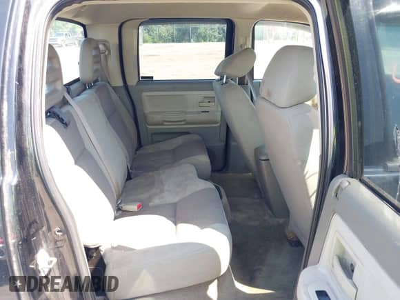 2005 Dodge Dakota SLT with VIN 1D7HW48N05S119919, listed as a IAAI auction lot 42605894 with 181,701 mi miles and . Bid and sale history available at DreamBid. Image 8.