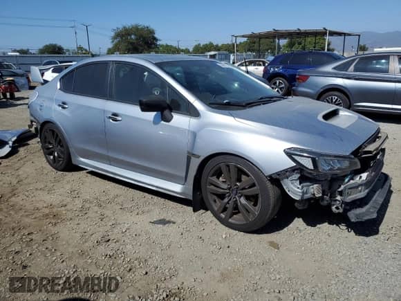 2016 Subaru WRX Premium with VIN JF1VA1E6XG9803173, listed as a Copart auction lot 64681725 with 186,608 mi miles and Salvage title. Bid and sale history available at DreamBid. Image 4.