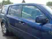 2014 Honda Pilot EX-L with VIN 5FNYF4H78EB021617, listed as a IAAI auction lot 43011573 with 205,499 mi miles and . Bid and sale history available at DreamBid. Image 13.